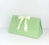 Solid color bow creative gift bags, hand-held triangular bag paper bags, 300g white card paper bags, cross-border exclusive supply Application Scenario